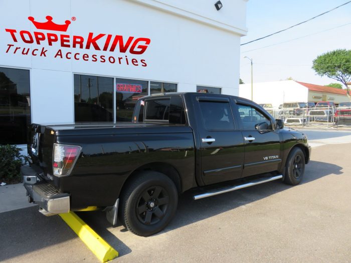 2005 Nissan Titan with LEER 700 tonneau, Nerf Bars, Bug Guard, Vent Visors, Tint, Hitch. Call TopperKING Brandon 813-689-2449 or Clearwater FL 727-530-9066.