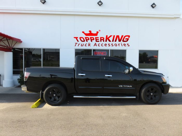 2005 Nissan Titan with LEER 700 tonneau, Nerf Bars, Bug Guard, Vent Visors, Tint, Hitch. Call TopperKING Brandon 813-689-2449 or Clearwater FL 727-530-9066.