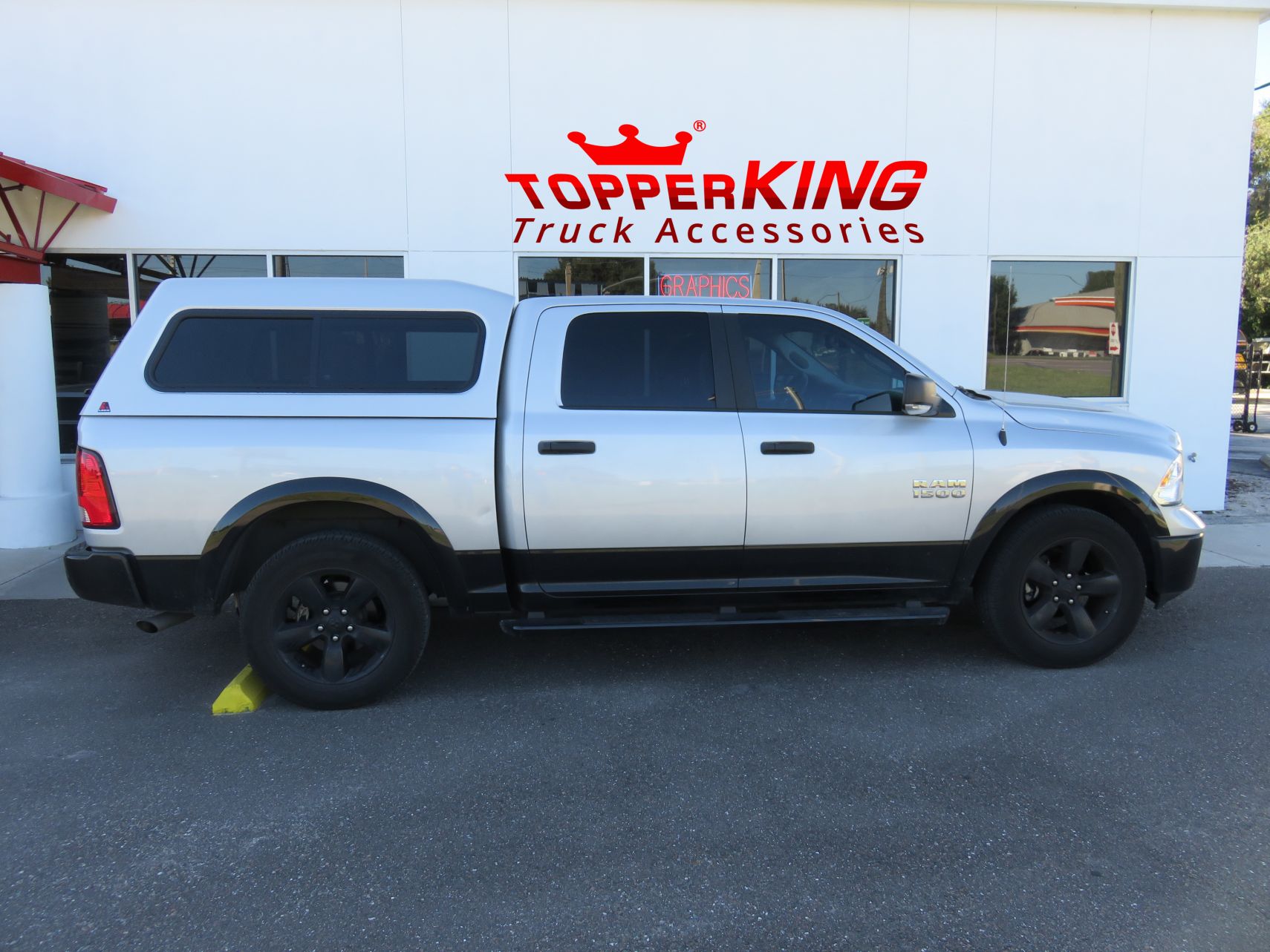 2015 Dodge RAM with LEER 180 Fiberglass Topper, Black Out Steps, Tint, and Hitch by TopperKING Brandon 813-689-2449 or Clearwater FL 727-530-9066. Call Now!