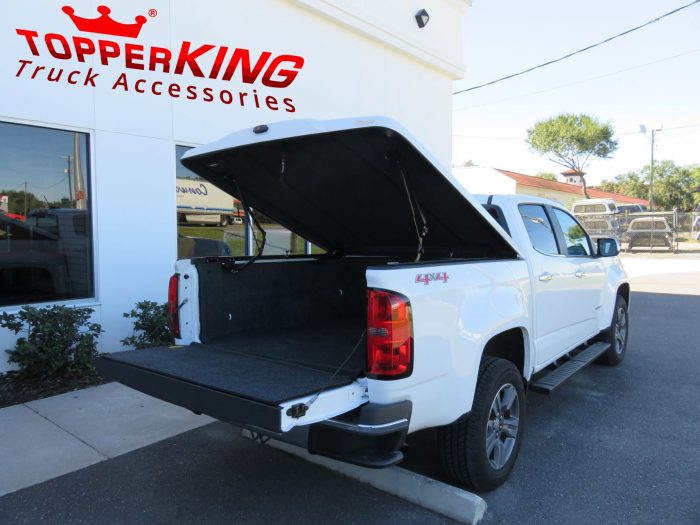 2015 Chevy Colorado with LEER 700 fiberglass tonneau Side Steps, BedRug, Tint by TopperKING in Brandon 813-689-2449 or Clearwater FL 727-530-9066. Call now!