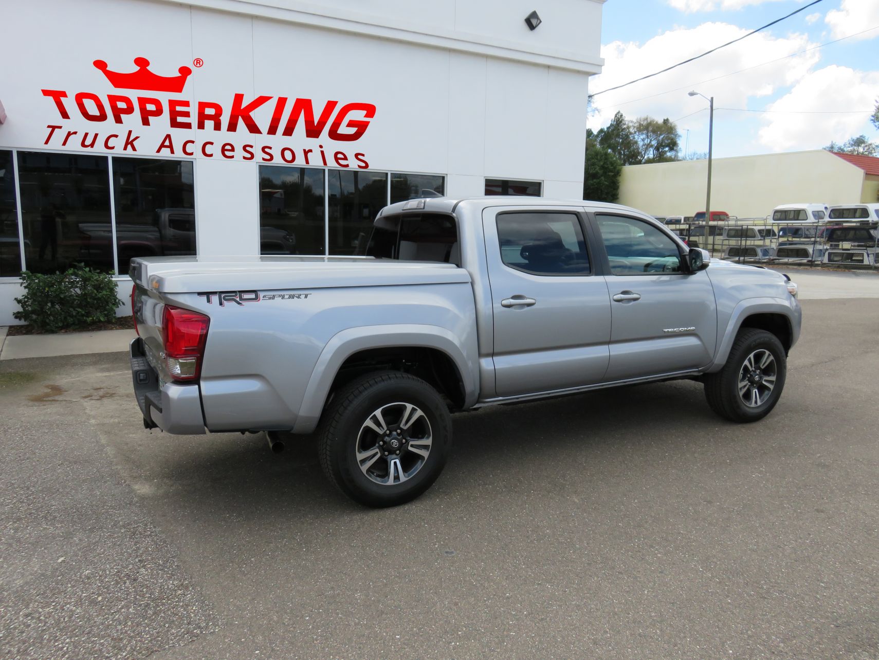 2017 Toyota Tacoma with LEER 700, Bug Guard, Chrome Accessories, Hitch, Tint by TopperKING Brandon 813-689-2449 or Clearwater FL 727-530-9066. Call Today!