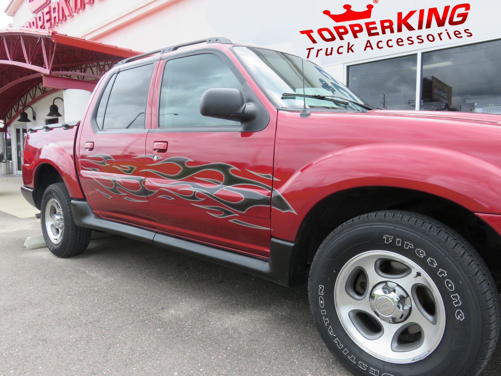 2005 Ford Explorer Sport Trac with Graphics, Bug Guard, Hitch, Bedliner, Tint. Call TopperKING Brandon 813-689-2449 Clearwater 727-530-9066.