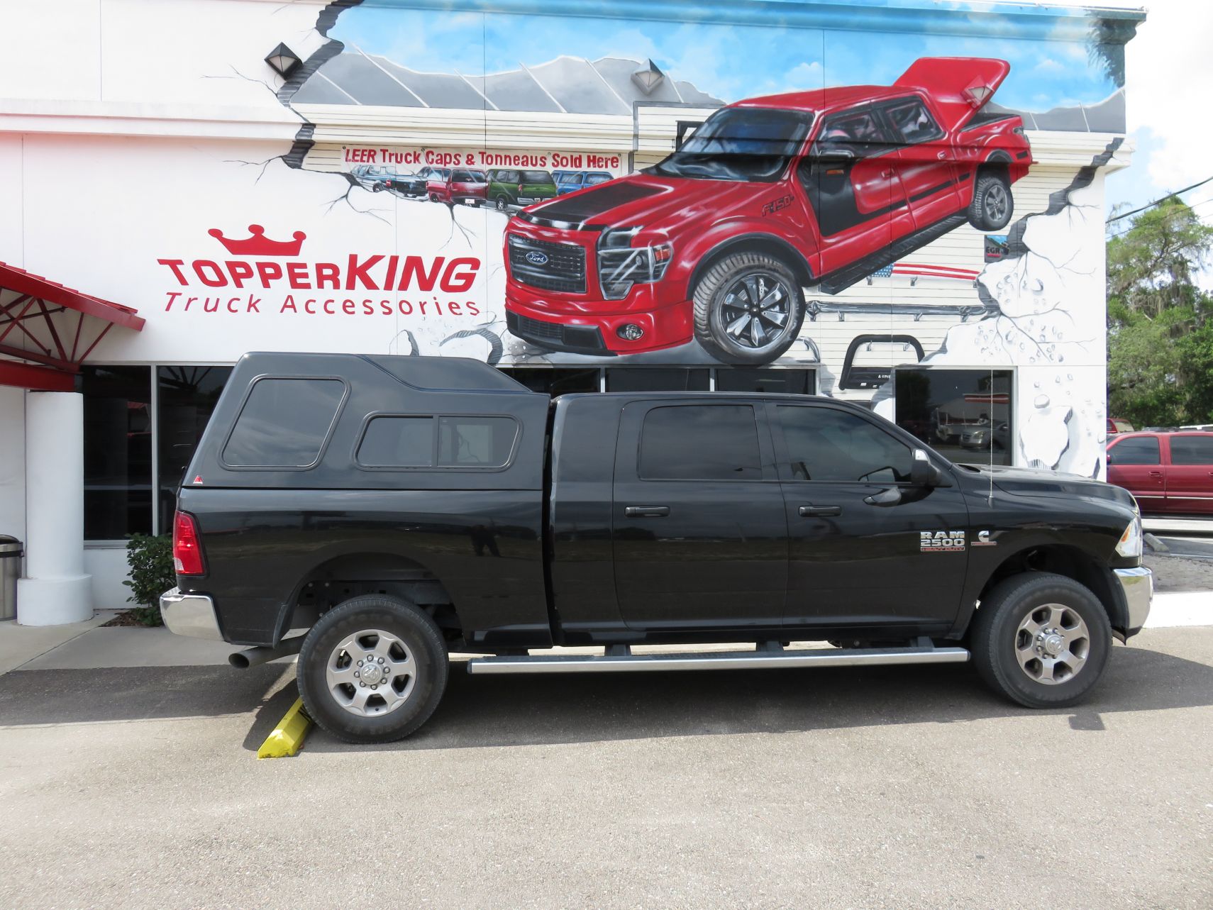 2015 Dodge RAM with LEER 122 fiberglass topper, Running Boards, Hitch, Tint by TopperKING in Brandon 813-689-2449 or Clearwater FL 727-530-9066. Call now!