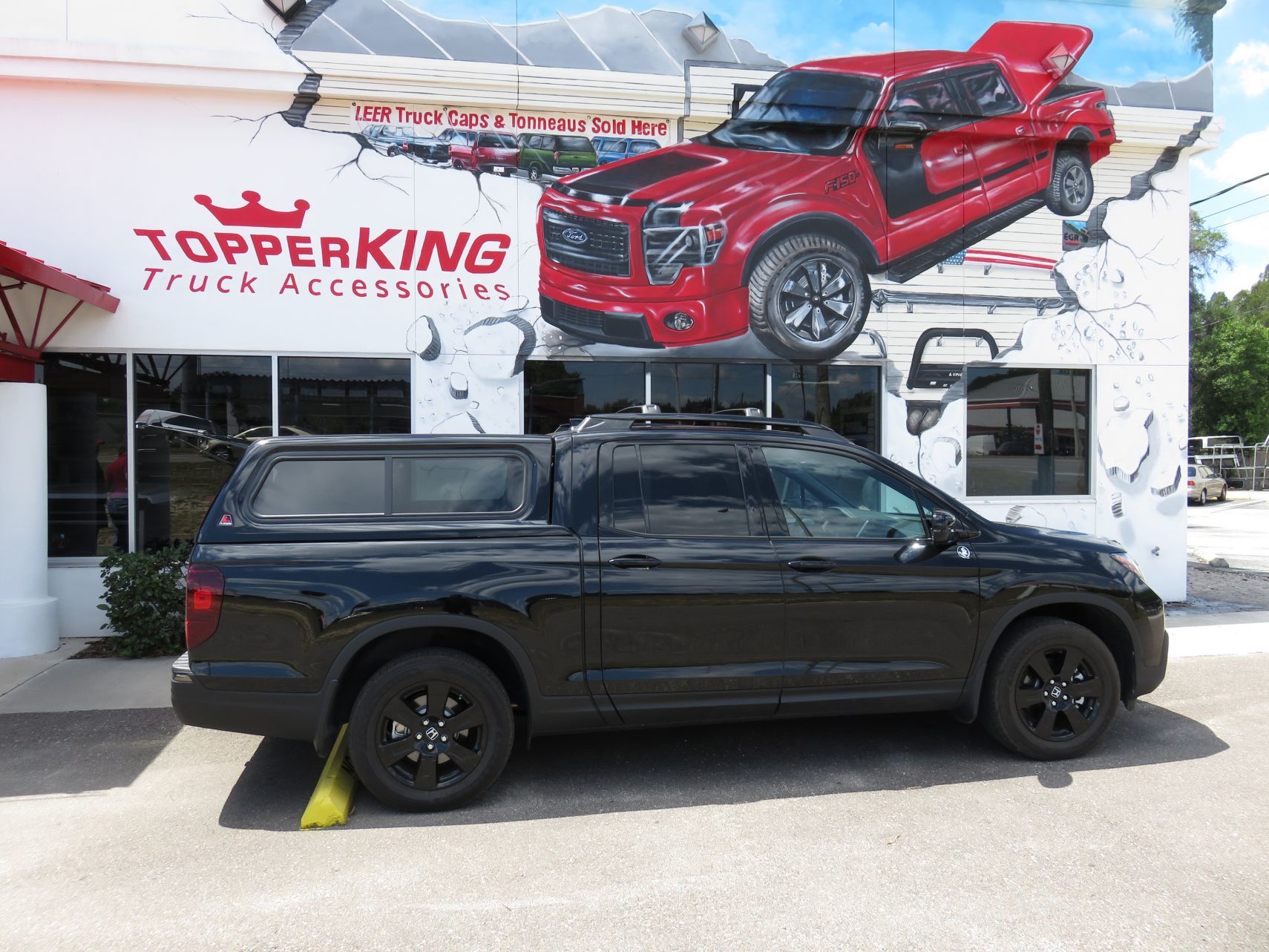 2017 Honda Ridgeline with LEER 100XR fiberglass topper, Roof Racks, Hitch, Tint by TopperKING in Brandon 813-689-2449 or Clearwater 727-530-9066. Call now!