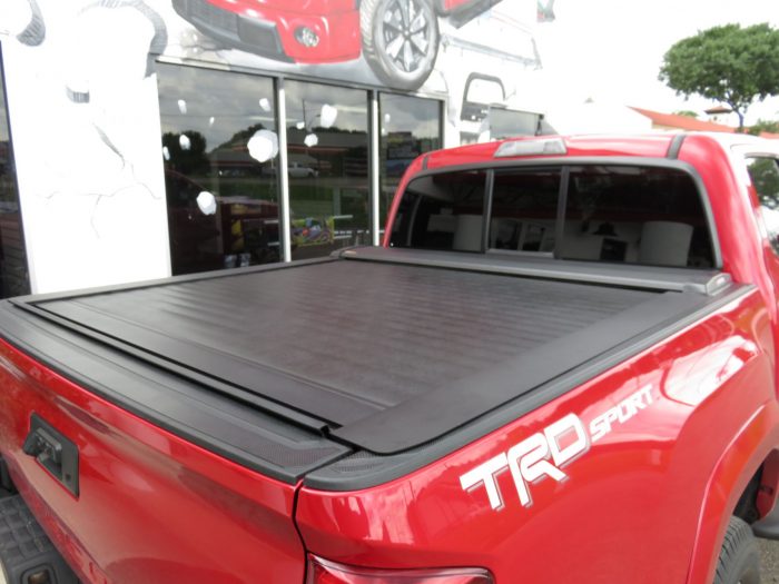2017 Toyota Tacoma with LEER Ricochet, Black Out Nerf Bars, Tint, Hitch by TopperKING in Brandon, FL 813-689-2449 or Clearwater, FL 727-530-9066. Call Now!