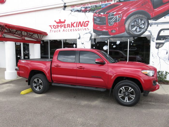 2017 Toyota Tacoma with LEER Ricochet, Black Out Nerf Bars, Tint, Hitch by TopperKING in Brandon, FL 813-689-2449 or Clearwater, FL 727-530-9066. Call Now!