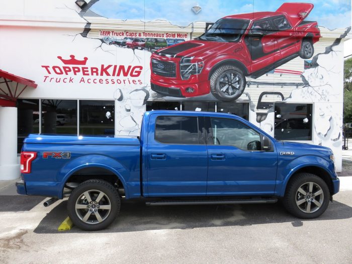 2017 Ford F150 with a LEER 700 Fiberglass Tonneau, Running Boards, Hitch, Tint by TopperKING Brandon 813-689-2449 or Clearwater FL 727-530-9066. Call now!