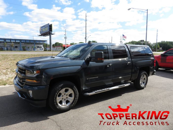 2017 Chevy Silverado with LEER 100XL fiberglass topper, Nerf Bars, Tint, Hitch by TopperKING Brandon 813-689-2449 or Clearwater FL 727-530-9066. Call today!