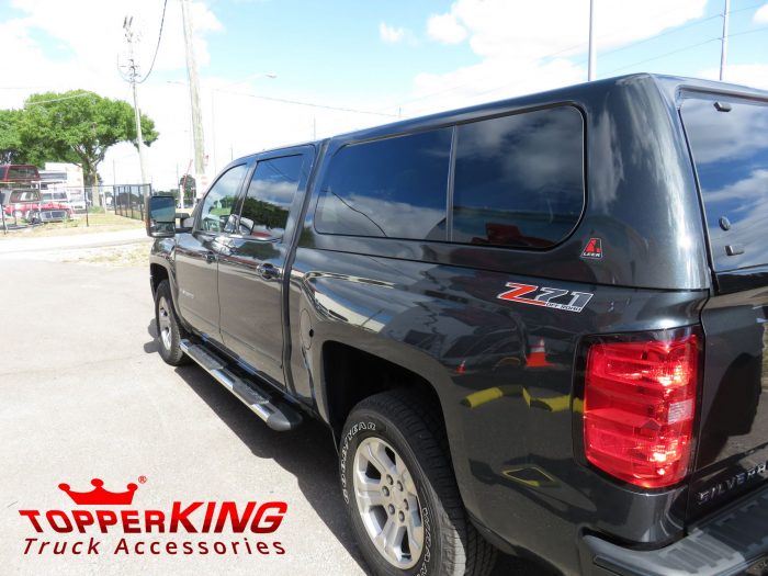 2017 Chevy Silverado with LEER 100XL fiberglass topper, Nerf Bars, Tint, Hitch by TopperKING Brandon 813-689-2449 or Clearwater FL 727-530-9066. Call today!