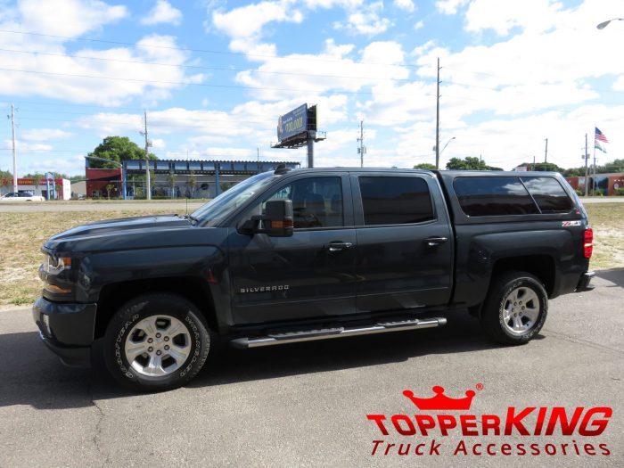2017 Chevy Silverado with LEER 100XL fiberglass topper, Nerf Bars, Tint, Hitch by TopperKING Brandon 813-689-2449 or Clearwater FL 727-530-9066. Call today!