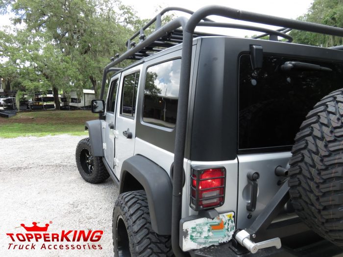 2015 Jeep Wrangler with Smittybilt Rack, Fender Flares, Hitch, Tint by TopperKING in Brandon, FL 813-689-2449 or Clearwater, FL 727-530-9066. Call today!