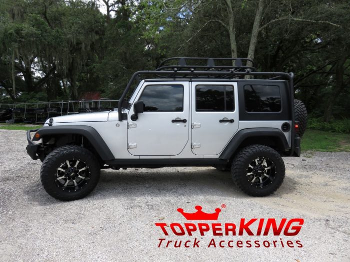 2015 Jeep Wrangler with Smittybilt Rack, Fender Flares, Hitch, Tint by TopperKING in Brandon, FL 813-689-2449 or Clearwater, FL 727-530-9066. Call today!