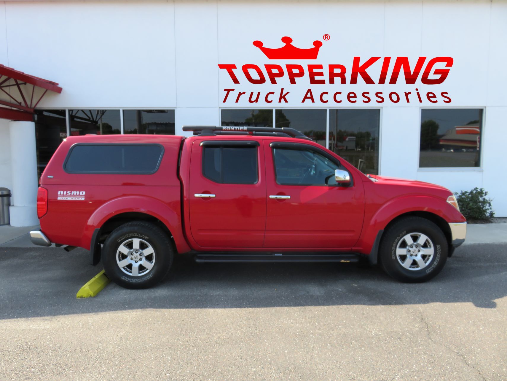 2014 Nissan Frontier with Ranch Echo, Running Boards, Roof Racks, Vent Visors, Tint, Hitch. Call TopperKING Brandon 813-689-2449 or Clearwater 727-530-9066!