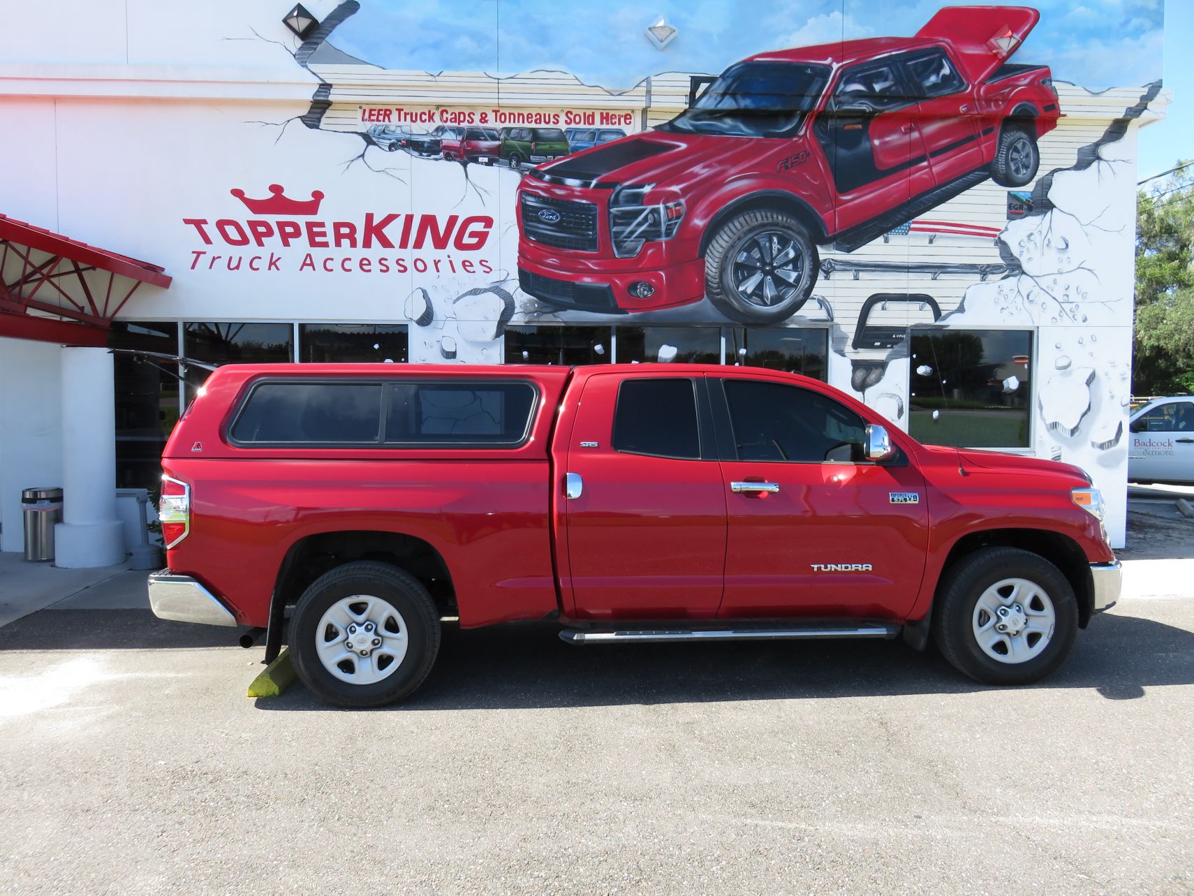 2016 Toyota Tundra with Leer 100XR, Nerf Bars, Chrome, Tint, Hitch by TopperKING in Brandon, FL 813-689-2449 or Clearwater, FL 727-530-9066. Call Today!