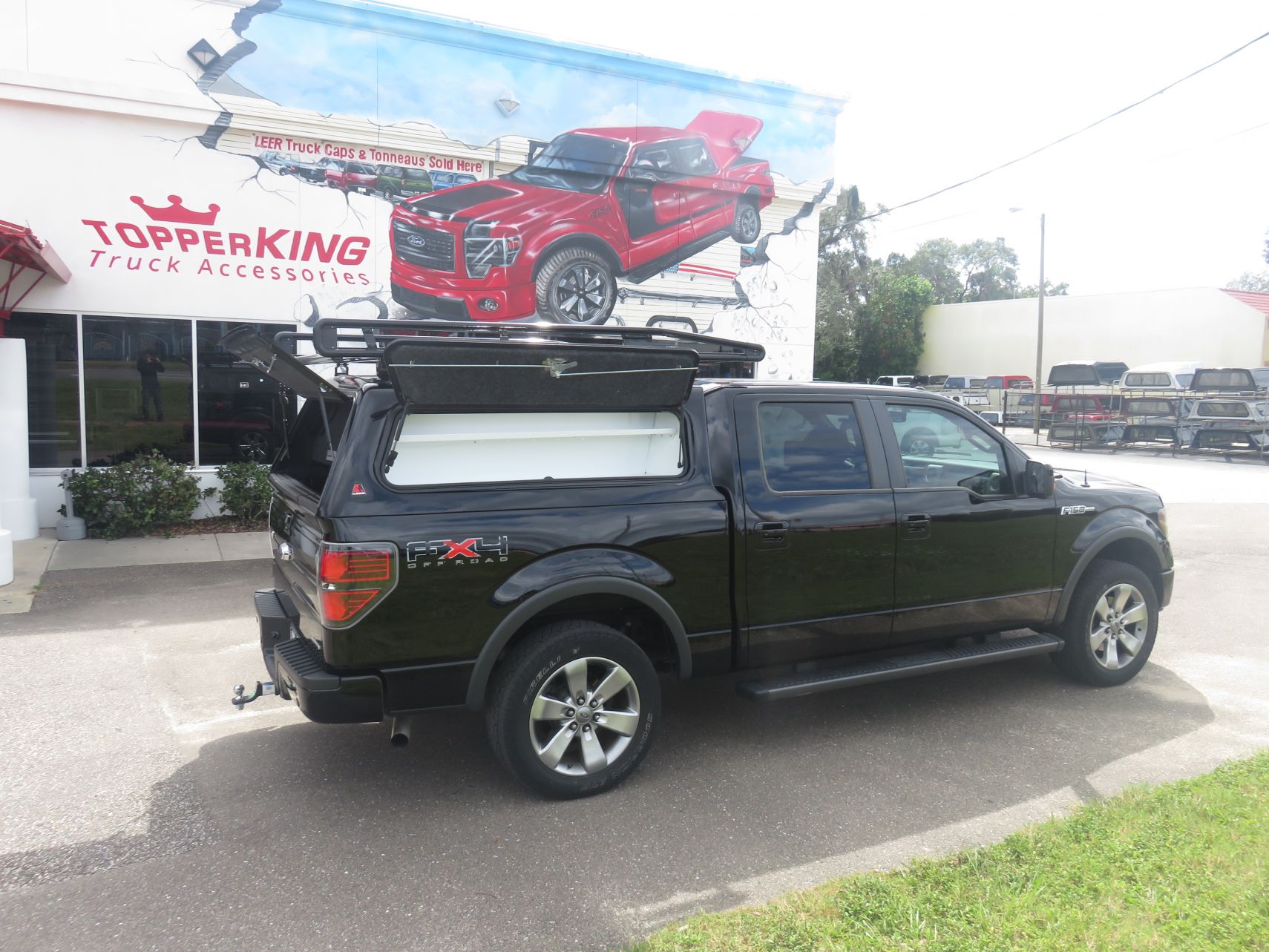Ford F150 with LEER 100RCC Commercial Topper, Roof Racks, Tool Boxes, Running Boards by TopperKING in Brandon 813-689-2449 or Clearwater 727-530-9066 Call!