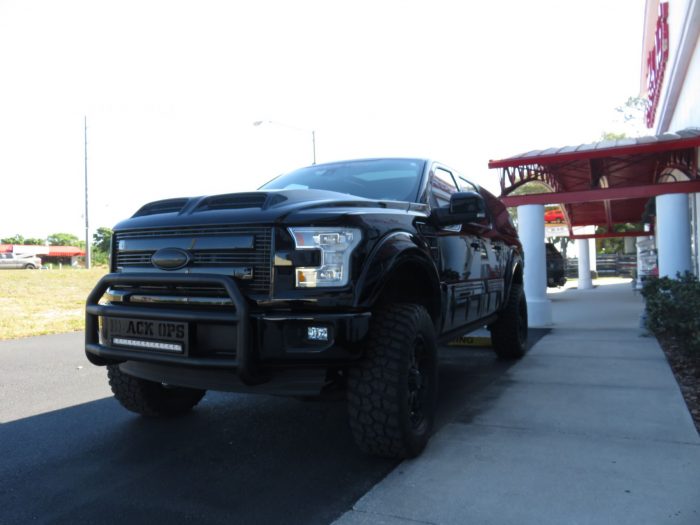 2018 Ford F150 with Leer 100XQ, Bull Bars, Hitch, Tint by TopperKING in Brandon, FL 813-689-2449 or Clearwater, FL 727-530-9066. Call today!