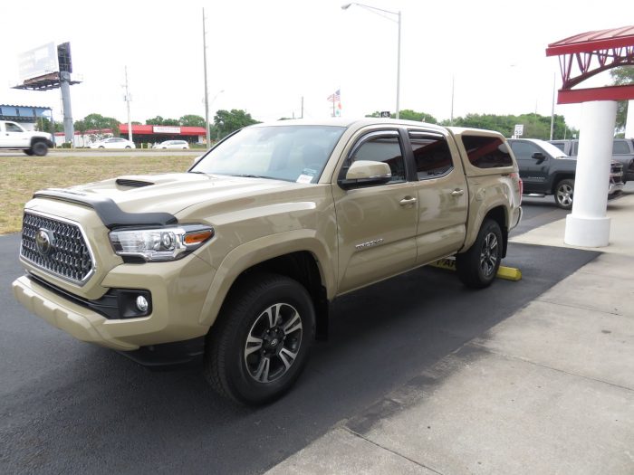 2018 Toyota Tacoma with Leer 100XQ, Bug Shield, Vent Visors, Hitch, Tint by TopperKING in Brandon, FL 813-689-2449 or Clearwater, FL 727-530-9066. Call Now!