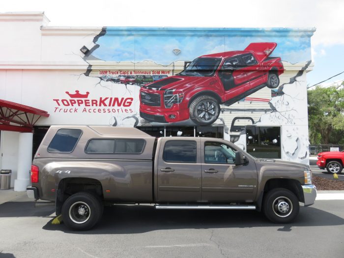 2013 Chevy Silverado with LEER 122, Nerf Bars, Hitch, Tint by TopperKING in Brandon, FL 813-689-2449 or Clearwater, FL 727-530-9066. Call today to start!