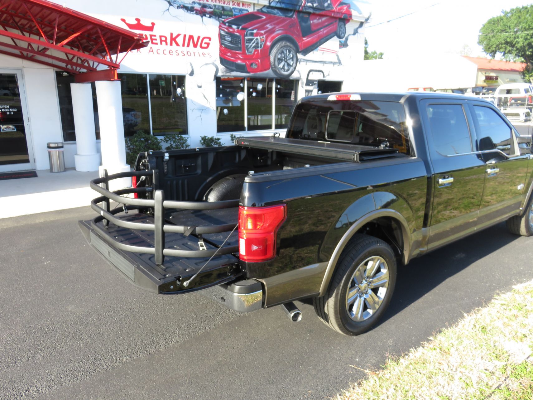 2018 Ford F150 with LEER 350M/TrilogyX2T, Hitch, BedXTender HD Sport by TopperKING in Brandon, FL 813-689-2449 or Clearwater, FL 727-530-9066. Call today!