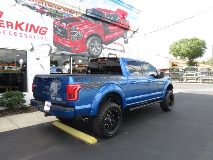 2015 Ford F150 with LEER 350M, Bull Bar, Side Steps, Graphics, Fender Flares. Call TopperKING Brandon 813-689-2449 or Clearwater 727-530-9066!