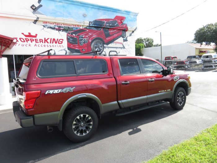 2018 Nissan Titan with Leer 100R, Roof Racks, Hitch, Nerf Bars, Tint by TopperKING in Brandon, FL 813-689-2449 or Clearwater, FL 727-530-9066. Call Today!