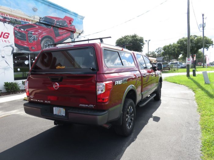 2018 Nissan Titan with Leer 100R, Roof Racks, Hitch, Nerf Bars, Tint by TopperKING in Brandon, FL 813-689-2449 or Clearwater, FL 727-530-9066. Call Today!