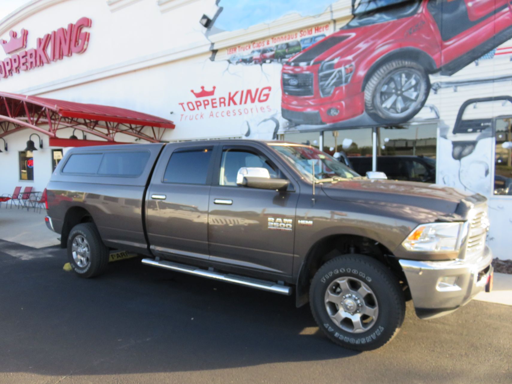 2018 Brown Dodge RAM 2500 LEER 100R, Nerf Bars, Custom Hitch, Vent Visors, by TopperKING in Brandon, FL 813-689-2449 or Clearwater, FL 727-530-9066.