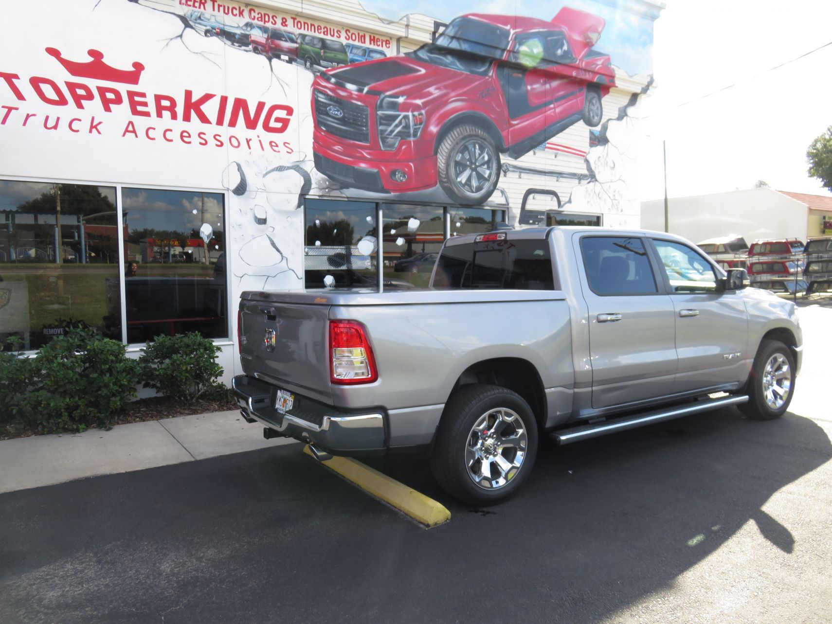 2019 Dodge RAM with LEER 550, Nerf Bars, Chrome, Tint, Hitch by TopperKING Brandon 813-689-2449 or Clearwater FL 727-530-9066. Call Today!