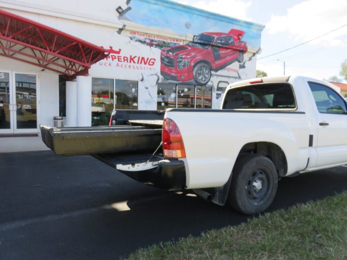 2010 Toyota Tacoma with Decked Cargo Management, Bedliner, Tint, Hitch by TopperKING in Brandon, FL 813-689-2449 or Clearwater, FL 727-530-9066. Call today!