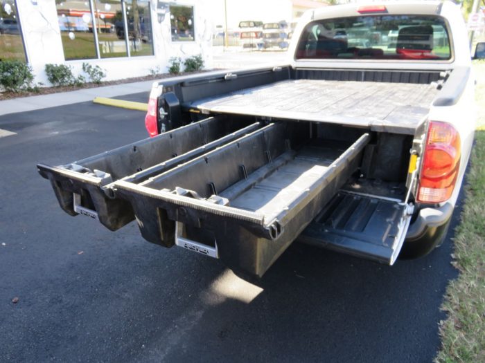 2010 Toyota Tacoma with Decked Cargo Management, Bedliner, Tint, Hitch by TopperKING in Brandon, FL 813-689-2449 or Clearwater, FL 727-530-9066. Call today!