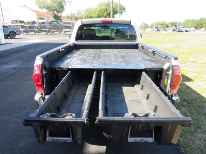 2010 Toyota Tacoma with Decked Cargo Management, Bedliner, Tint, Hitch by TopperKING in Brandon, FL 813-689-2449 or Clearwater, FL 727-530-9066. Call today!