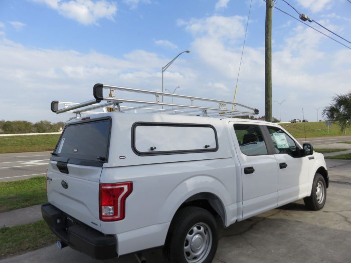 2015 Ford F150 Ranch Sierra Commercial Fiberglass Topper, Roof Racks, Hitch by TopperKING in Brandon FL 813-689-2449 or Clearwater 727-530-9066. Call today!
