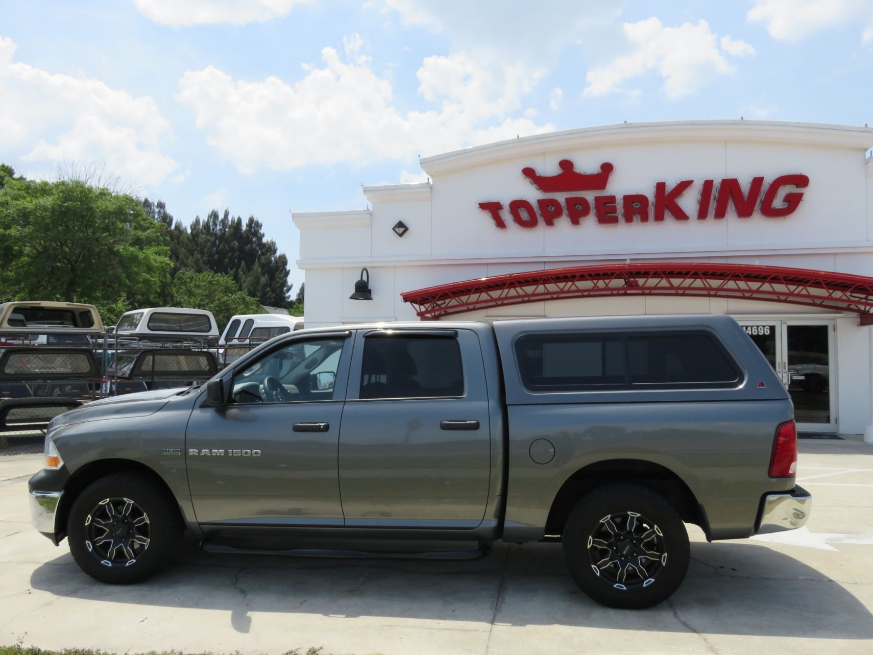 2017 Dodge Ram with LEER 100XR, Tint, Blacked Out Nerf Bars, Vent Visors. Call TopperKING Brandon 813-689-2449 or Clearwater FL 727-530-9066.