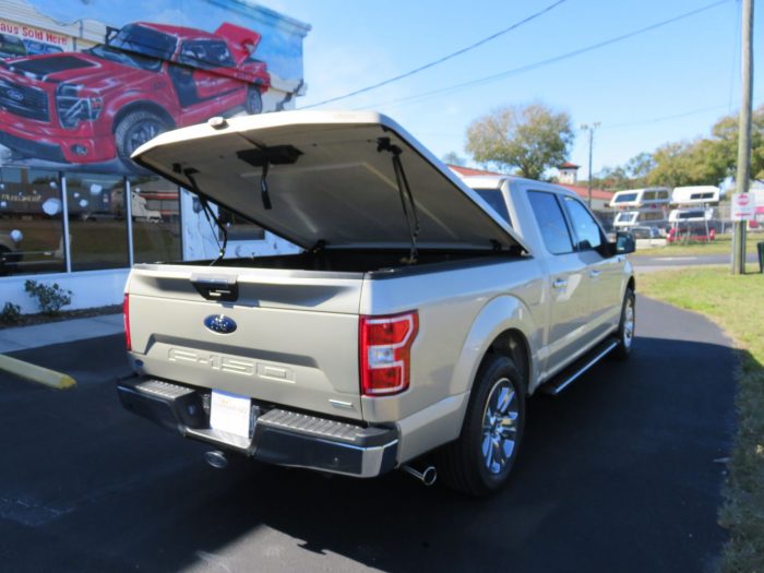 2019 Ford F150 LEER 550 Lid, Tint, Nerf Bars, Bedliner, Hitch by TopperKING Brandon 813-689-2449 or Clearwater, FL 727-530-9066. Call today!