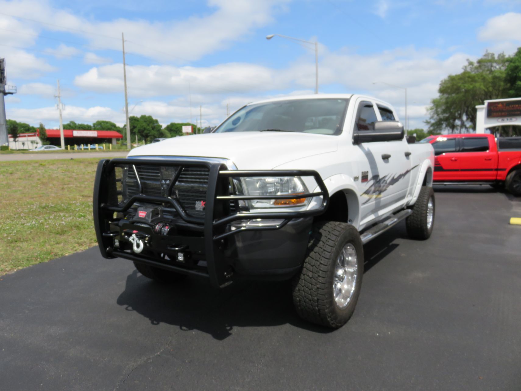 2011 Dodge RAM Grill Guard, Gaphic, Fender Flares, Tool Box, Vent Visor, Hitch. Call TopperKING Brandon 813-689-2449 Clearwater 727-530-9066.