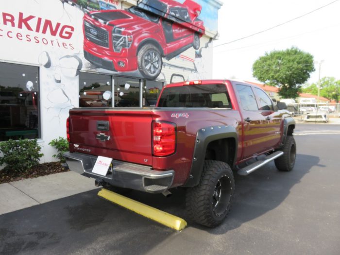 2014 Chevy Silverado with LEER 350M, Fender Flares, Nerf Bars, Tint, Hitch by TopperKING in Brandon 813-689-2449 or Clearwater, FL 727-530-9066. Call today!