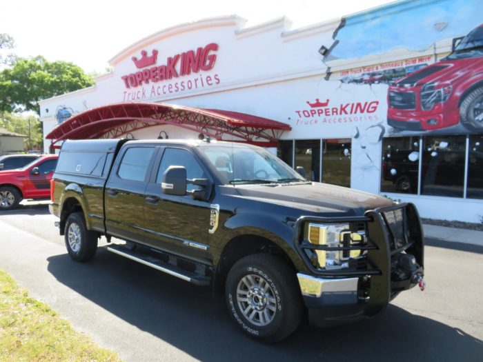 2019 Black Ford F250 LEER DCC Construction Topper, Nerf Bars, Hitch by TopperKING in Brandon, FL 813-689-2449 or Clearwater, FL 727-530-9066. Call today!