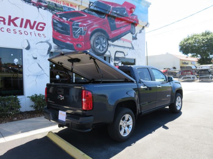 2019 Chevy Colorado with LEER 550, Chrome, Pinstripe, Retractable Step, Tint, Hitch by TopperKING Brandon 813-689-2449 or Clearwater 727-530-9066. Call Now!