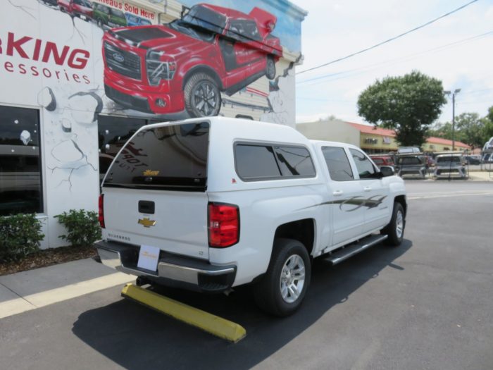 2018 Chevy Silverado with Leer 180, Custom Graphics, Nerf Bars, Bug Guard, Tint, Hitch. Call TopperKING in Brandon 813-689-2449 or Clearwater 727-530-9066!