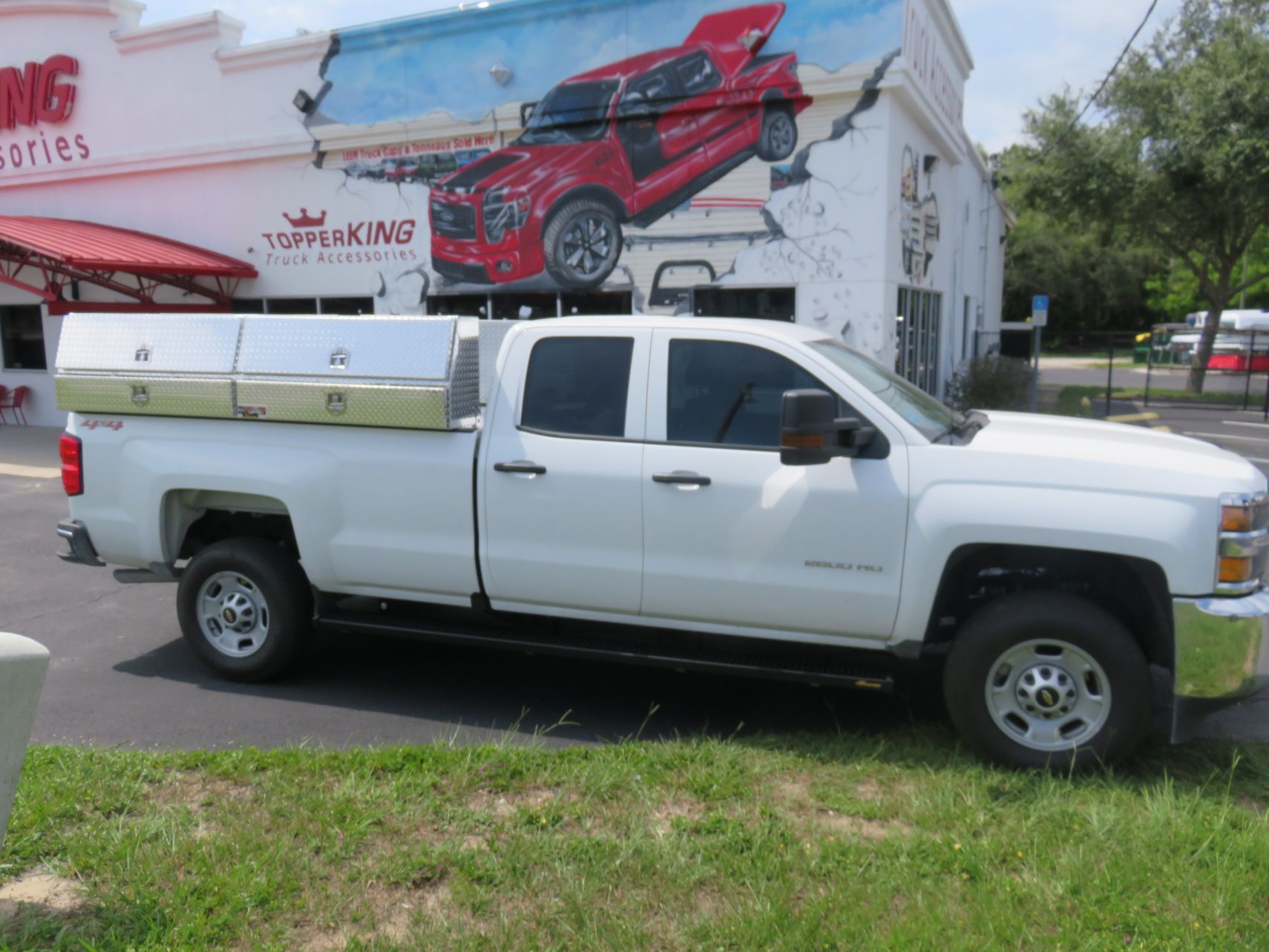 2018 Commercial Silverado with Weather Guard Pack Rat, Side Mount Tool Boxes by TopperKING in Brandon 813-689-2449 or Clearwater 727-530-9066. Call today!