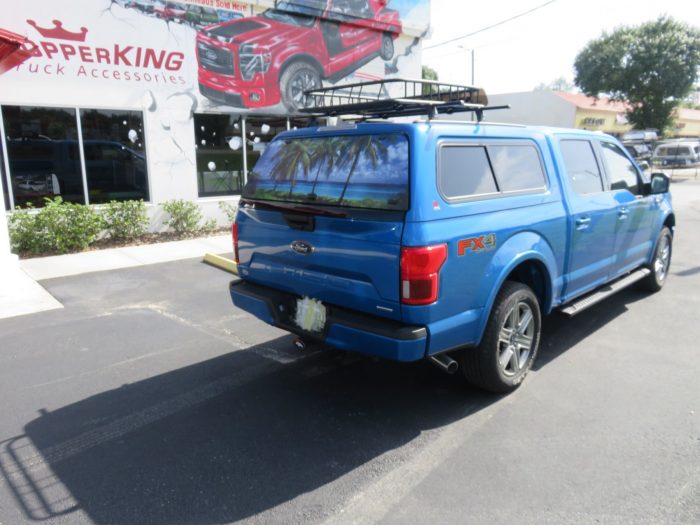 2019 Ford F150 with LEER 100XR, Cargo Basket, Window Graphic, Running Boards, Bug Guard. Call TopperKING Brandon 813-689-2449 or Clearwater, FL 727-530-9066