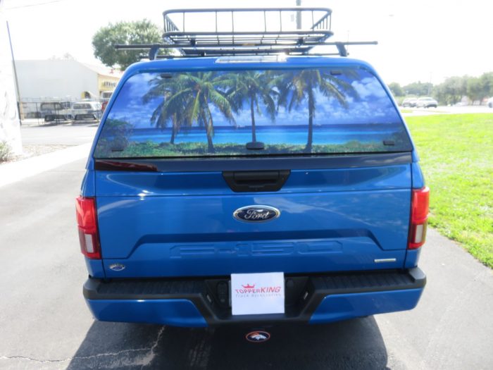 2019 Ford F150 with LEER 100XR, Cargo Basket, Window Graphic, Running Boards, Bug Guard. Call TopperKING Brandon 813-689-2449 or Clearwater, FL 727-530-9066