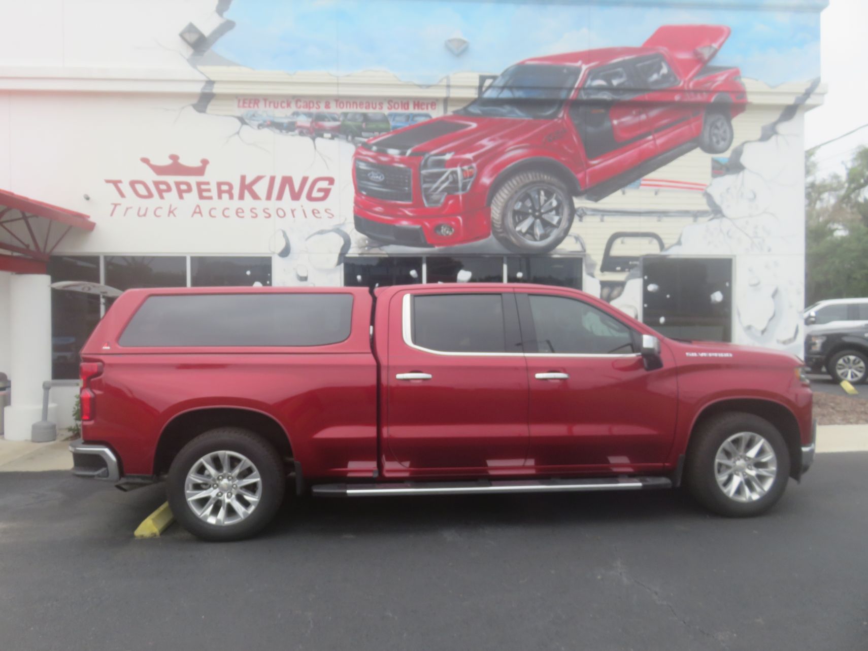 2019 Chevy Silverado with LEER 100XQ Fiberglass Topper, Nerf Bars, Chrome, Hitch, Tint. Call TopperKING in Brandon 813-689-2449 or Clearwater 727-530-9066!