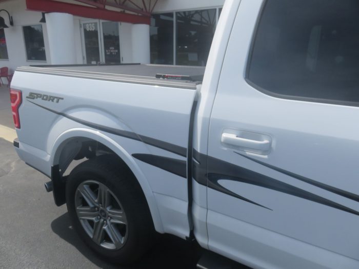 2017 Ford F150 with RollnLock Retractable Lid, Graphic, Nerf Bar, Tint, Hitch. TopperKING in Brandon 813-689-2449 Clearwater, FL 727-530-9066