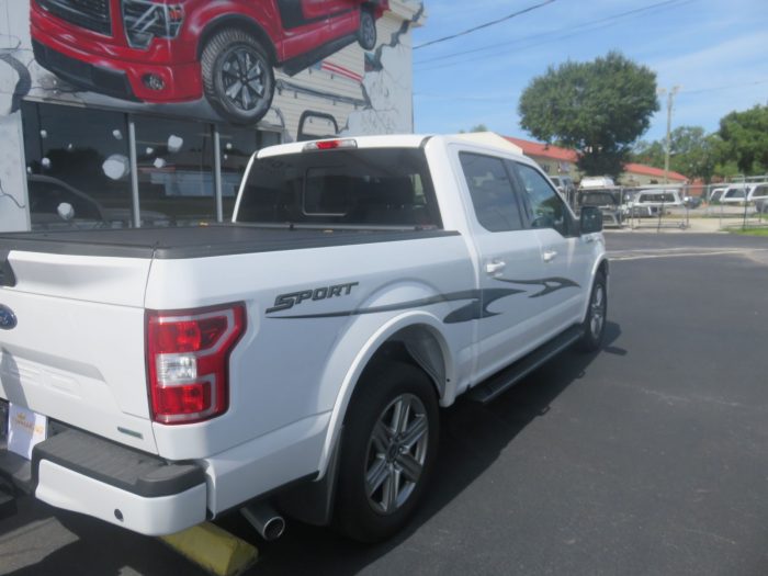 2017 Ford F150 with RollnLock Retractable Lid, Graphic, Nerf Bar, Tint, Hitch. TopperKING in Brandon 813-689-2449 Clearwater, FL 727-530-9066