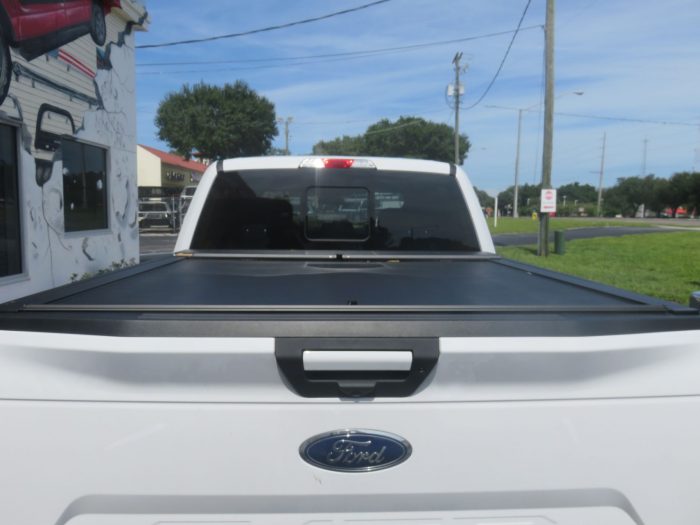 2017 Ford F150 with RollnLock Retractable Lid, Graphic, Nerf Bar, Tint, Hitch. TopperKING in Brandon 813-689-2449 Clearwater, FL 727-530-9066