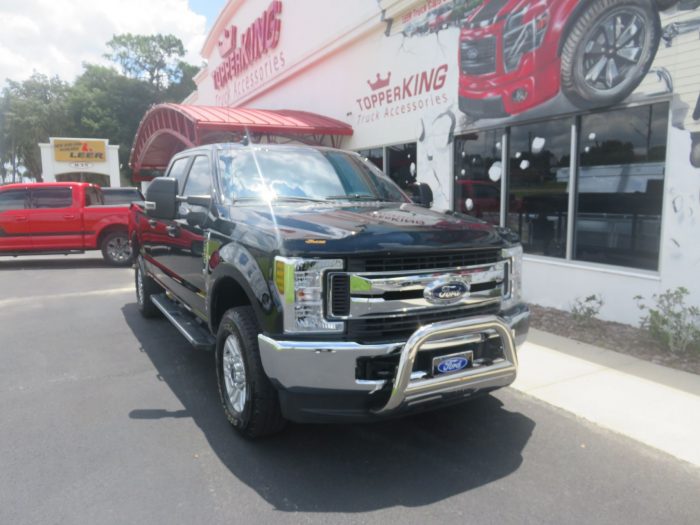2019 Ford F250 with Adjustable Hitch, Bull Bars, Tool Box, Nerf Bars, Bug Guard, Tint. Call TopperKING Brandon 813-689-2449 or Clearwater FL 727-530-9066!