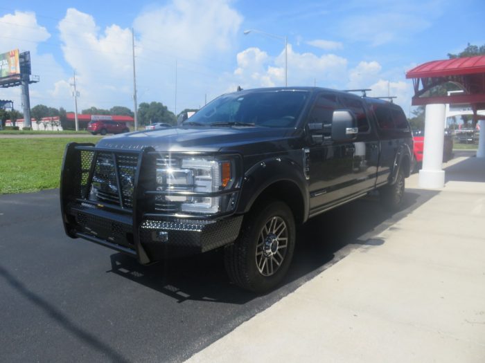 2019 Ford F250 with LEER 100R, Grill Guard, Roof Rack, Retractable Step by TopperKING Brandon 813-689-2449 or Clearwater FL 727-530-9066.