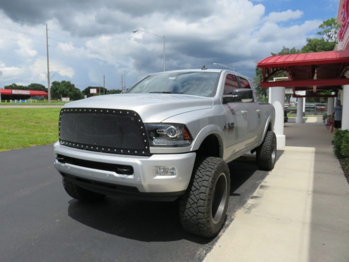 2019 Dodge RAM with LEER 350M Folding Tonneau, Custom Grill, Tint, Hitch by TopperKING in Brandon, FL 813-689-2449 or Clearwater, FL 727-530-9066. Call Now!