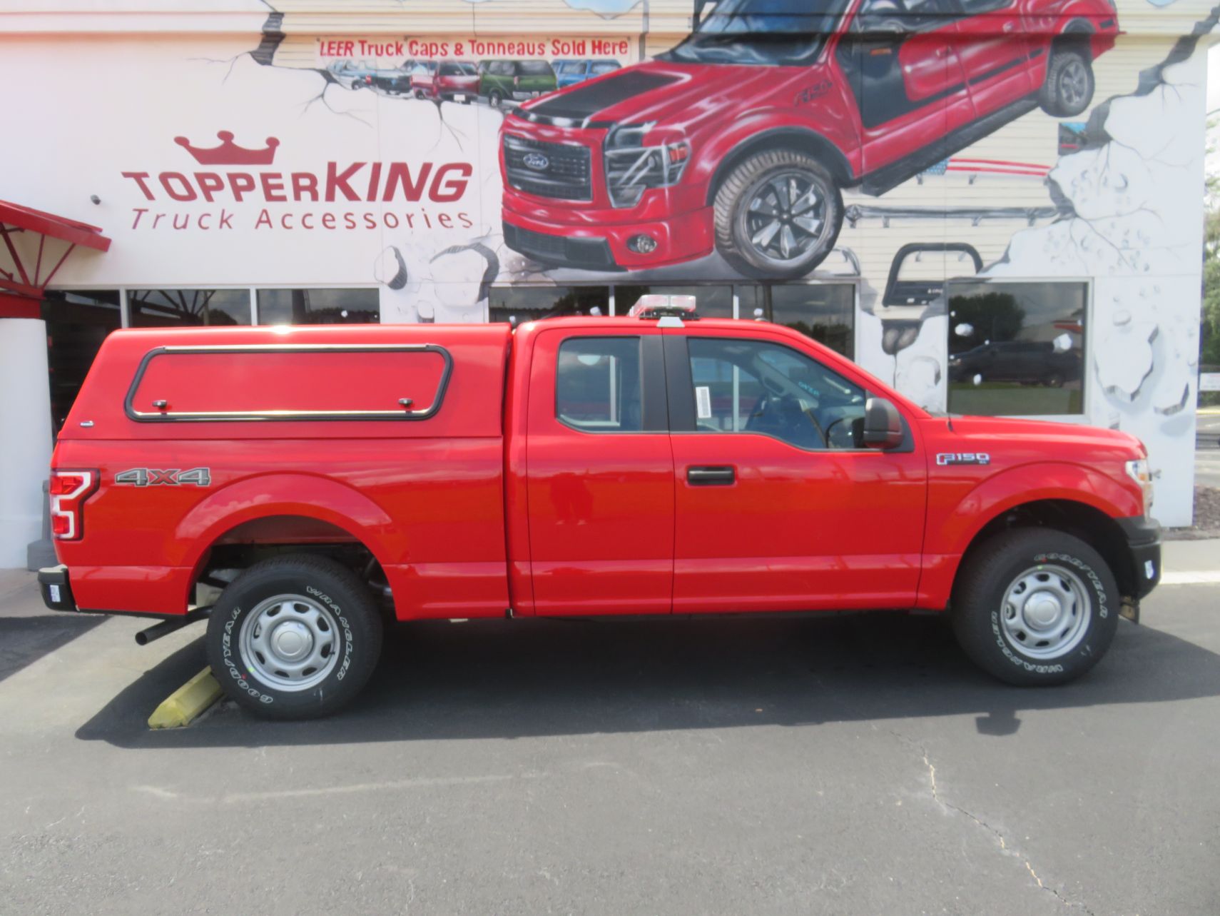 2019 Ford F150 with Ranch Echo, Solid Side Access Windoors, Hitch by TopperKING in Brandon, FL 813-689-2449 or Clearwater, FL 727-530-9066. Call today!